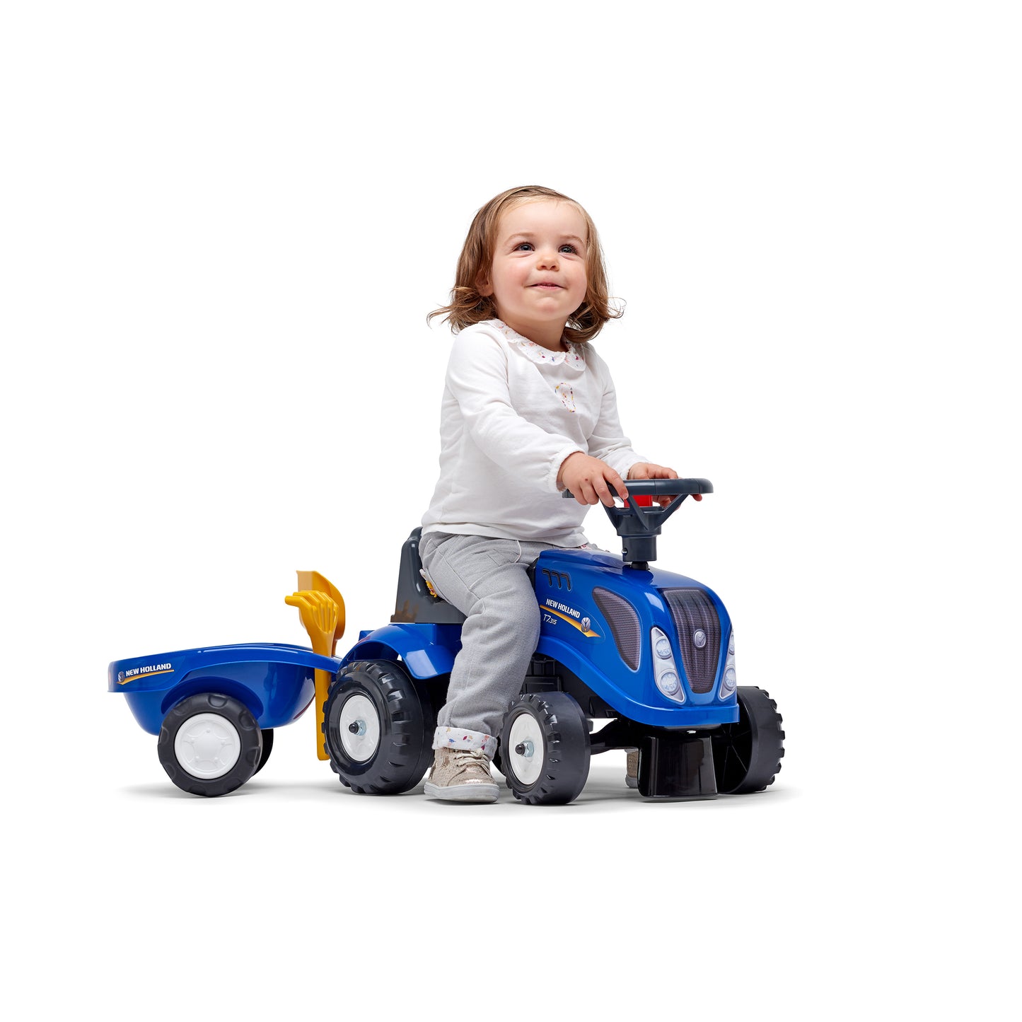 Ride-on traktori peräkärryllä, haravalla ja lapiolla baby New Holland FALK